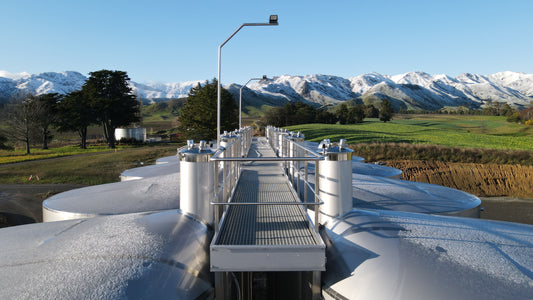 A crisp winter morning at Leefield Station with snow-covered hills in the background.
