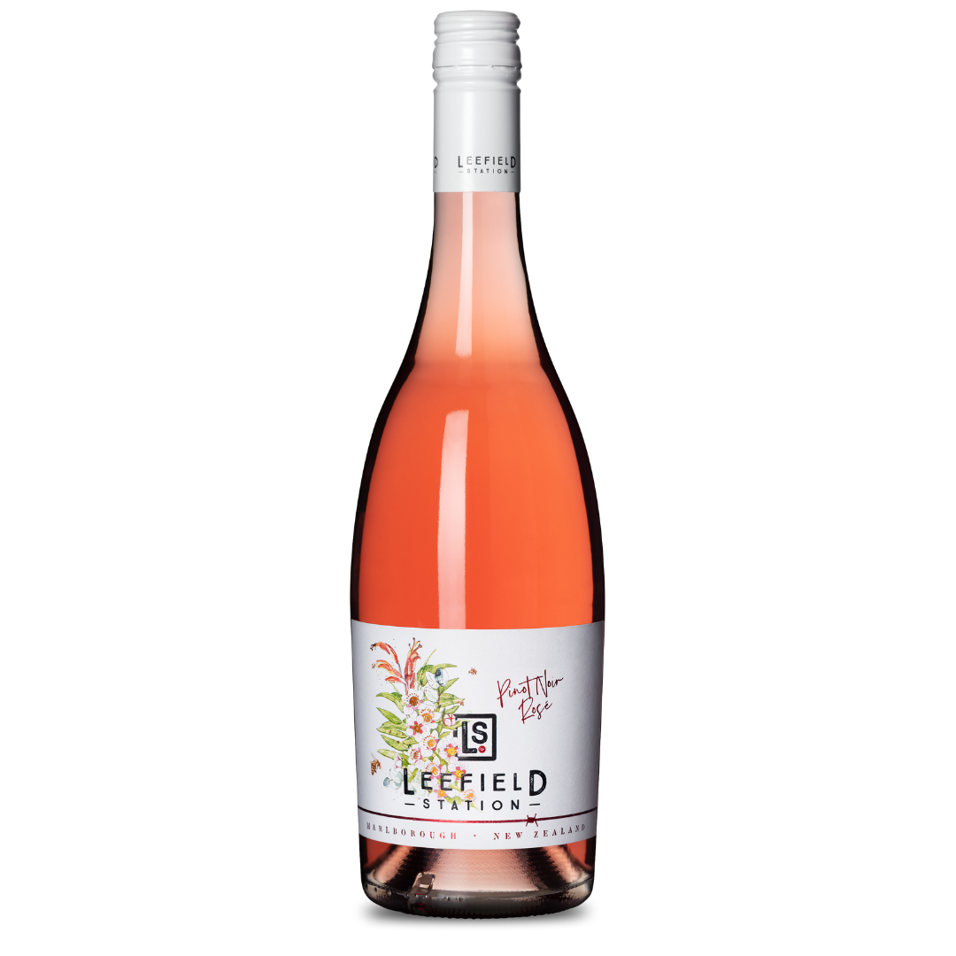 A bottle of Leefield Station Pinot Noir Rosé 2023 wine, with a light pink hue, features a floral design label detailing its Marlborough, New Zealand origin and variety. It offers delightful floral aromas and juicy acidity.