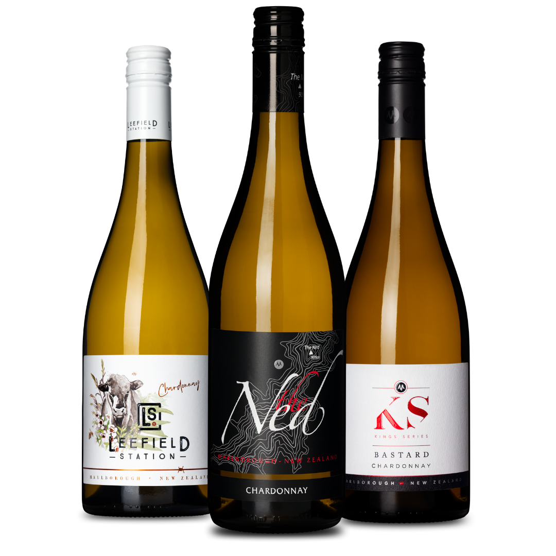 Three wine bottles standing together on a plain white background: Leefield Station Chardonnay on the left, a black-necked The Ned Chardonnay in the center with a large white and black The Ned label, and the Kings Series (KS) Bastard Chardonnay on the right with a white and red label. All from Marisco Vineyards, Marlborough, NZ.