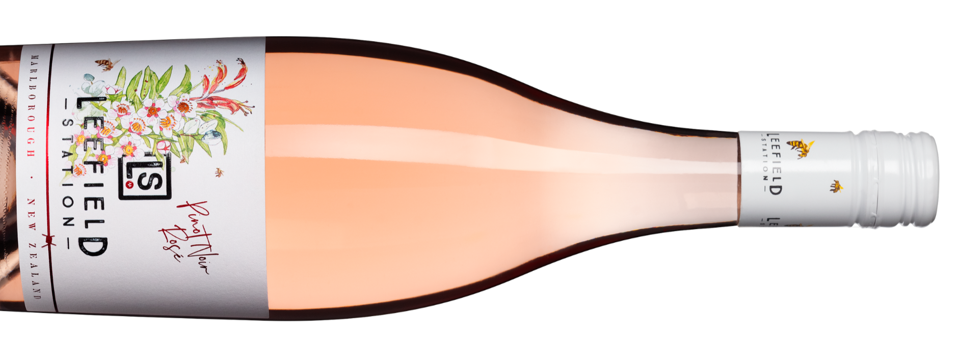 A bottle of Left Field Pinot Noir Rosé from Marlborough, New Zealand. The label features colorful floral artwork and a white cap with the brand logo.