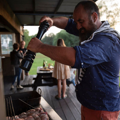 Anton Rasmussen, G.M of Viticulture at Marisco Vineyards, Marlborough, NZ. BBQ'ing at The Neds River Hut on the side of the Waihopai River.