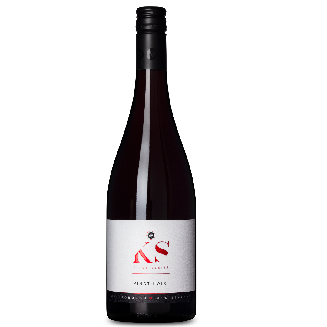 A bottle of THE KINGS SERIES PINOT NOIR 2022 from Marisco Family Vineyards features a dark glass and a screw cap. Its white label, adorned with red and black text, proudly announces its New Zealand origin.